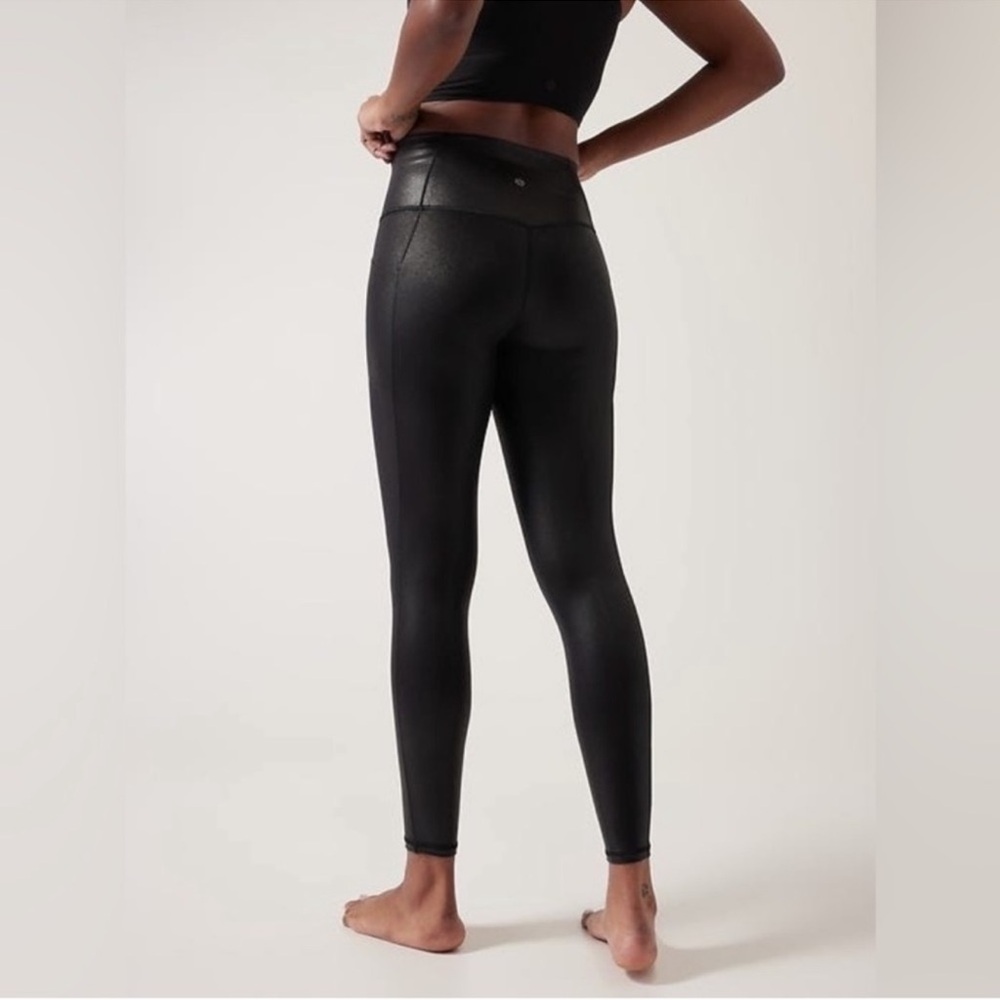 Athleta Salutation Stash Shine Tight 27" high waisted Black Shimmer large
